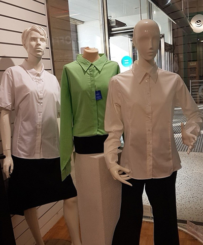 Garments on mannequins in a Salvation Army store