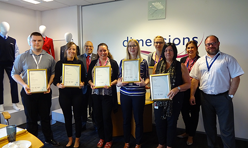 Julie and her team accepting their certificates!